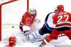 John Woods / the associated press
Jets forward Evander Kane scores against Carolina's Brian Boucher in front of Derek Joslin (27).