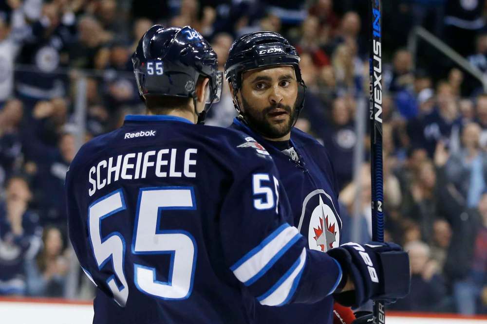 JOHN WOODS / WINNIPEG FREE PRESS
Four players on the Jets, including Dustin Byfuglien will represent Winnipeg on the International stage in the World Cup of Hockey tournament in Toronto this fall. And there could be more.