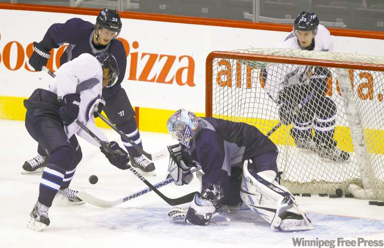 TREVOR HAGAN / WINNIPEG FREE PRESS
The Jets get in one final workout Friday at the MTS Centre before taking the ice for their regular-season opener today against the Montreal Canadiens.