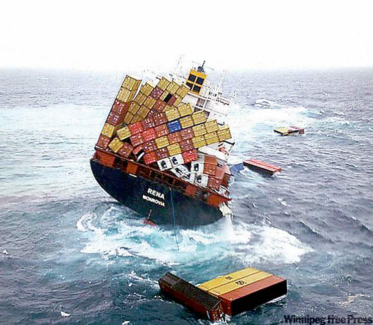 CP
blair harkness / the associated press
Shipping containers float Wednesday around the cargo ship Rena, which has been foundering since it ran aground Oct. 5.