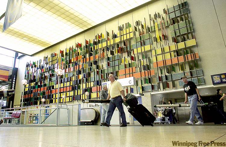 KEN GIGLIOTTI / WINNIPEG FREE PRESS archives
Art by John Graham on the north wall of the airport terminal complements the mid-20th-century building.