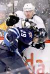 CP
John Woods / the canadian press archives
Jets defenceman Johnny Oduya takes out Pittsburgh Penguins forward Pascal Dupuis on Monday night.