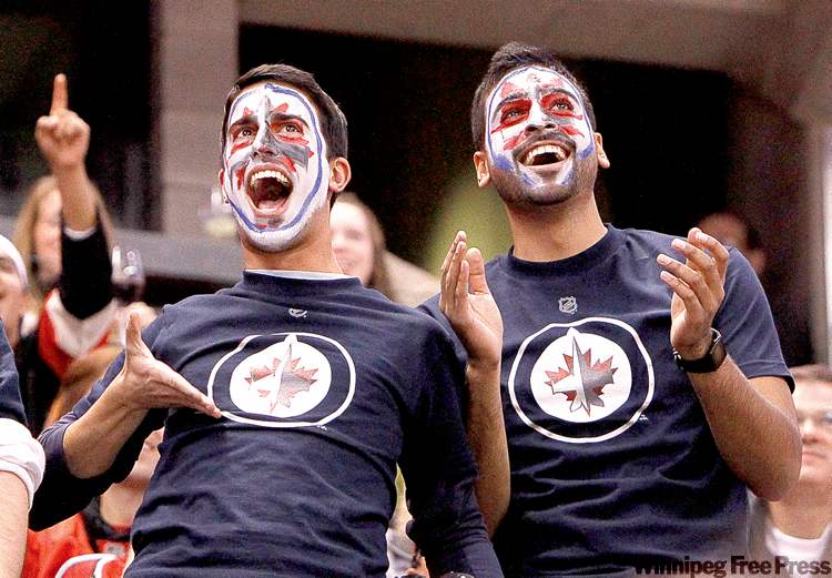 Postmedia Ottawa Citizen
Jean Levac / postmedia news
Fans of the Winnipeg Jets have fun during first-period NHL action in Ottawa Thursday.