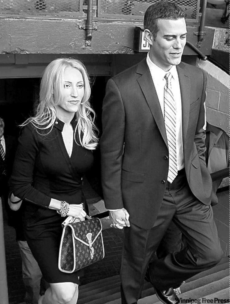 Tribune Media MCT
Antonio Perez / mcclatchey news service
Chicago Cubs team president Theo Epstein and wife Marie Whitney enter Wrigley Field in Chicago, Tuesday.