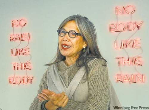 WAYNE GLOWACKI/WINNIPEG FREE PRESSManila-born artist Lani Maestro with her neon installation at Plug In ICA.