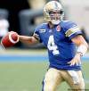 John Woods/Winnipeg Free Press
Winnipeg Blue Bombers' Buck Pierce (4) throws against the Calgary Stampeders in first half CFL action in Winnipeg, Thursday, July 14, 2011.  Pierce did not return to the game after half-time due to an injury. John Woods/Winnipeg Free Press