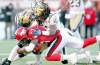 colleen de neve / postmedia news
Winnipeg Blue Bombers defensive backs Jovon Johnson (left) and Alex Suber combine to lay a dreadful hit on Stamps running back LaMarcus Coker.