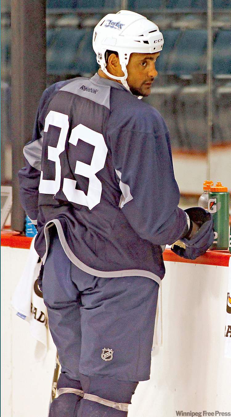 JOHN WOODS / THE CANADIAN PRESS ARCHIVES
Dustin Byfuglien's helter-skelter style hasn't impressed many fans, some of whom feel he is costing the Jets points.