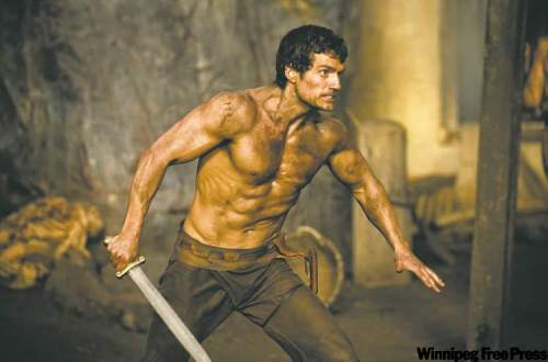 Postmedia photo: Jan Thijs
Alliance FilmsHenry Cavill is playing Theseus, but his abs of steel suggest he�s been prepping for his upcoming role as the Man of Steel.