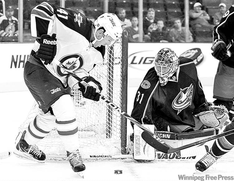 CP
jay laprete / the associated press ARCHIVES
Jason Jaffray (above, in a pre-season tilt against Columbus) gets his first taste of NHL action at the MTS Centre tonight with the Tampa Bay Lightning in town.