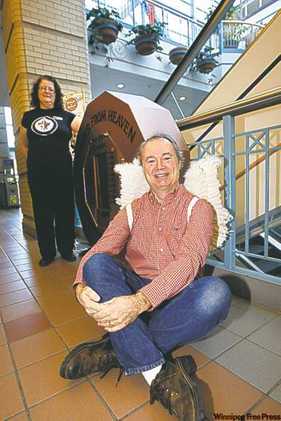 Ken Gigliotti / Winnipeg Free Press
Portage Place customer service rep Margret Young and Kevin Rollason are looking for some holiday magic to help needy.