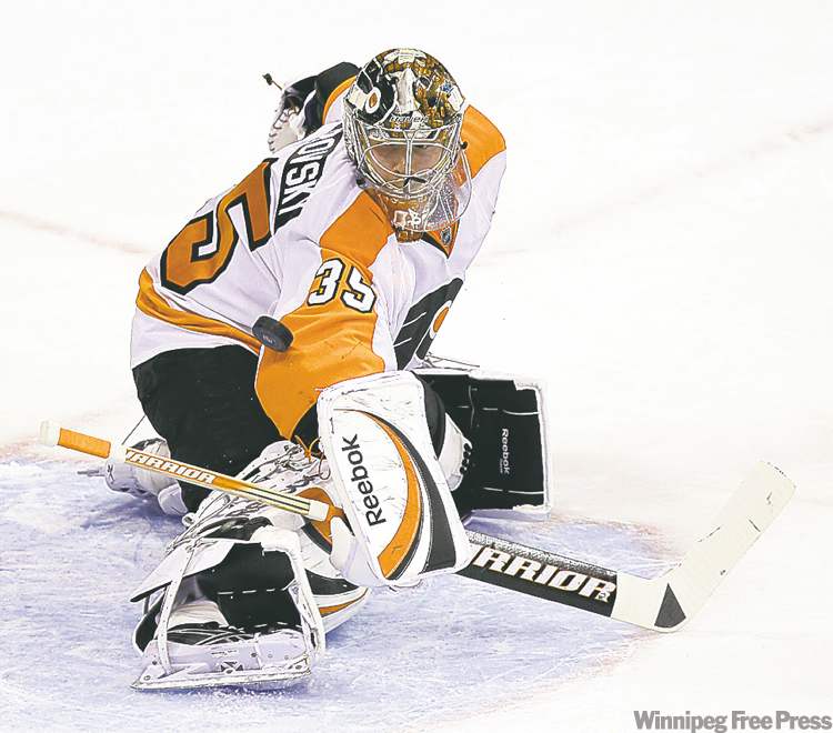 CP
trevor hagan / winnipeg free press
It was Flyers goalie Sergei Bobrovsky�s play � not possible fan reaction to Ilya Bryzgalov � that kept him in the game, coach Peter Laviolette said Saturday.