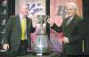 Postmedia PNG
Ward Perrin / Postmedia News Winnipeg Blue Bombers coach Paul LaPolice (left) and B.C. Lions boss Wally Buono get a grip on the Grey Cup during Wednesday�s coaches conference.