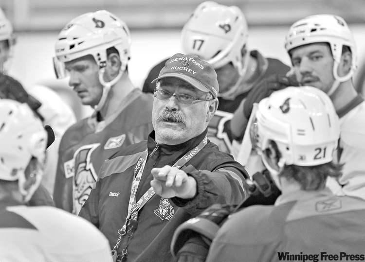 JOE BRYKSA / WINNIPEG FREE PRESS
Senators head coach and former Jet Paul MacLean (centre) barks orders at practice on Monday at the MTS Centre.