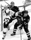 CP
John Woods / the canadian press
When not scoring goals, Jets defenceman Mark Stuart (5) can usually be found in his own end of the rink, helping out his goalie.