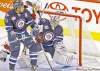 CP
john woods / the canadian press
Winnipeg Jets goaltender Ondrej Pavelec stops a New Jersey Devils� shot as defenceman Dustin Byfuglien and Devils forward Dainius Zubrus look for the rebound during third period NHL action at the MTS Centre in Winnipeg Saturday.