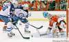 Gerry Broome / The Associated Press Archives
Carolina Hurricanes Cam Ward (30) defends the goal as Winnipeg Jets' Blake Wheeler (26) and Evander Kane (9) attempt to score during the first period of an NHL hockey game in Raleigh, N.C., Friday, Nov. 25, 2011. Winnipeg won 3-1. Winnipeg will host the Canes Dec. 9 at the MTS Centre.