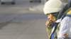 Joe Bryksa / WInnipeg Free Press
Sophie Morris, mother of several children and current resident of the Main Street Project, sniffs solvent while sitting against a wall beside Logan Avenue before being led away by Downtown Watch officers