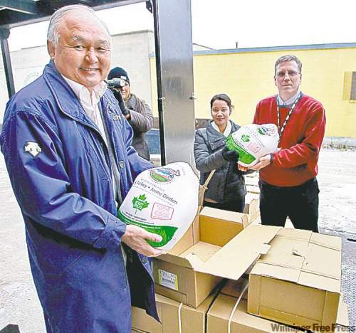 Ray Chang (left), Adel Cosino of Color Ad, and Floyd Perras
