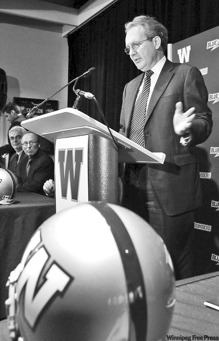 WAYNE GLOWACKI / WINNIPEG FREE PRESS
Murray Taylor, president and CEO of Investors Group, announces that the financial services company has bought the naming rights to the Winnipeg Blue Bombers new stadium (top), which will be called Investors Group Field. The stadium is scheduled to open in time for the Winnipeg Blue Bombers home opener in 2012.