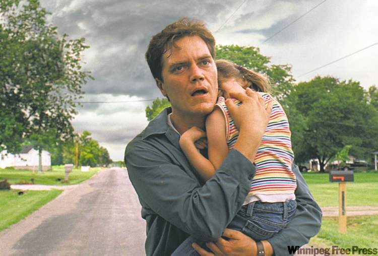 GROVE HILL PRODUCTIONS
Apocalypse now: Shannon tries to outrun the storm with his daughter in Take Shelter.