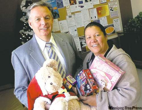 BORIS MINKEVICH / WINNIPEG FREE PRESS
Brian Cyncora and Nancy Flett strive to make underprivileged kids happy.