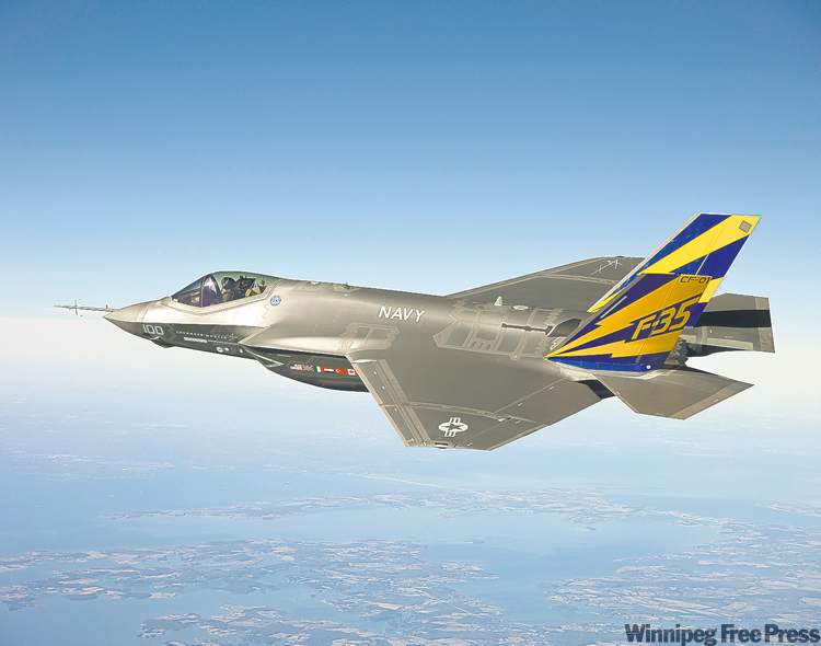 CP
U.S. Navy / The Associated Press Archives
A variant of the F-35 Joint Strike Fighter, the F-35C, conducts a test flight.