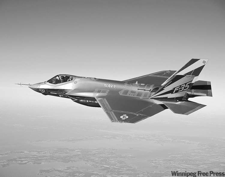 CP
U.S. Navy / The Associated Press Archives
A variant of the F-35 Joint Strike Fighter, the F-35C, conducts a test flight.