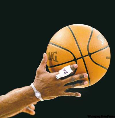 Associated Press archives
Los Angeles Lakers guard Kobe Bryant wears a Power Balance bracelet on his wrist during the first half of an NBA basketball game with the Detroit Pistons in Los Angeles.
