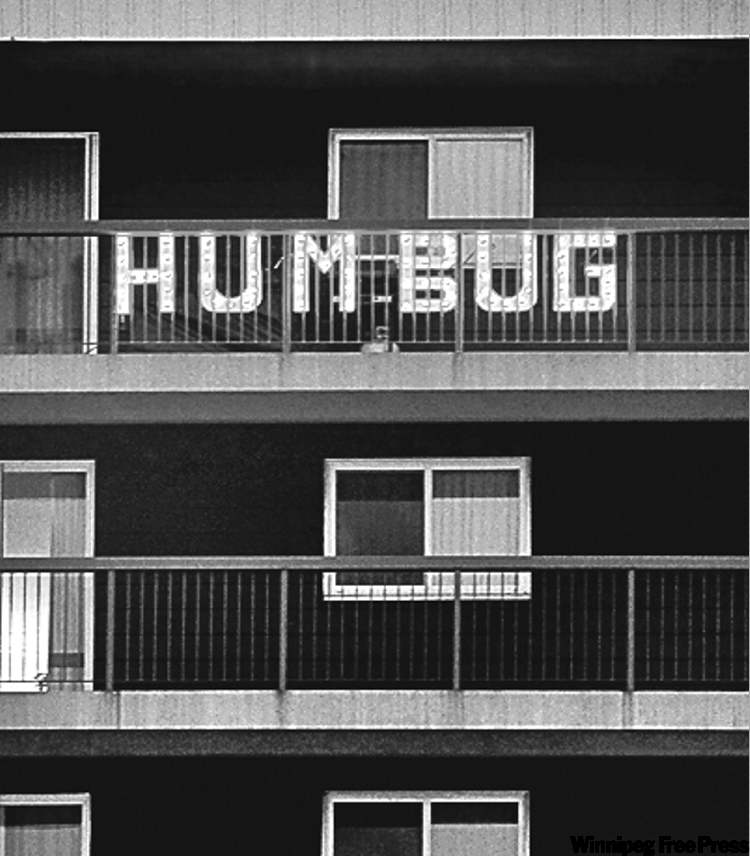Don Guzda inherited the tradition of lighting the Humbug sign every Christmas season from the top floor of a Polo Park-area apartment tower.