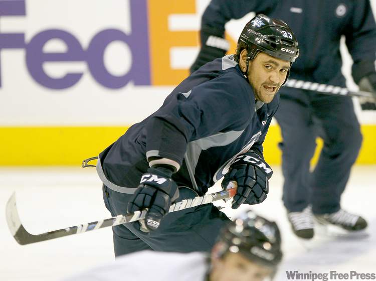 JOE BRYKSA / WINNIPEG FREE PRESS ARCHIVES
Big blue-liner Dustin Byfuglien will be out until 2012 with a lower-body injury.