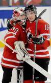 Larry Wong/ Postmedia News
Mark Stone and goalie Scott Wedgewood, who also grew up with visions of world juniors in his head, celebrate  Canada's 3-2 victory over  the Americans.
