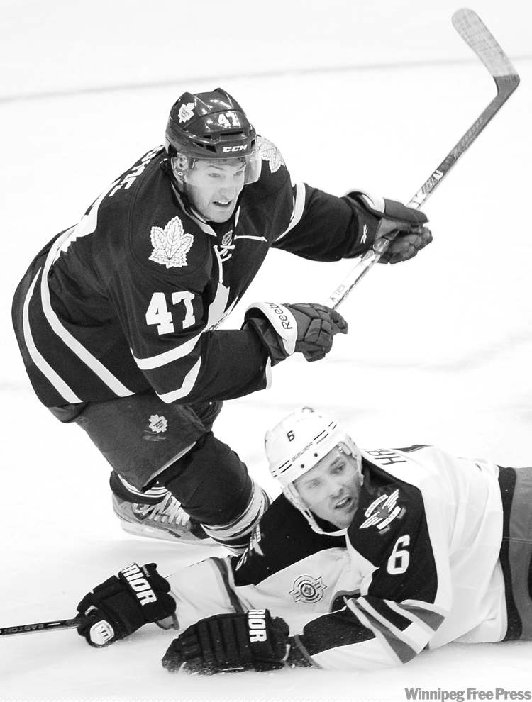 Postmedia (Darren Calabrese/Nati
Darren Calabrese / postmedia news
Winnipeg Jets defenceman Ron Hainsey gets an ice-level look at the play in front of Toronto�s Darryl Boyce.