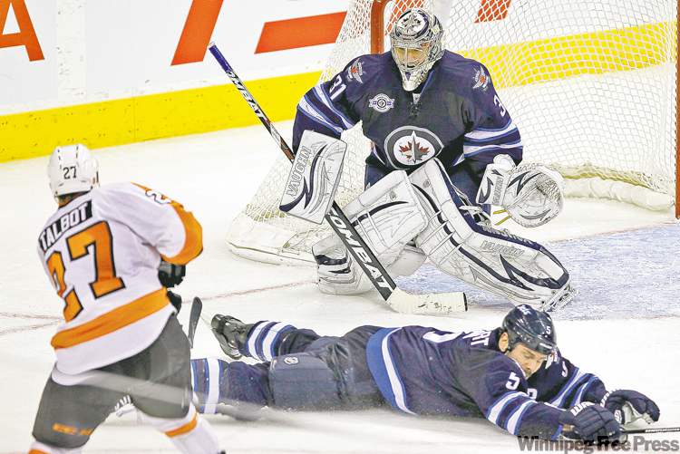 WINNIPEG FREE PRESS
John Woods / WINNIPEG FREE PRESS ARCHIVES
The Jets have improved exponentially in the penalty-killing department, and a lot of that is thanks to Mark Stuart�s 107 blocked shots, like this one vs. Philadelphia.