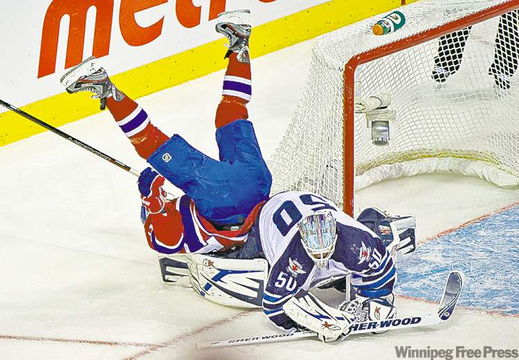 CP
Paul Chiasson / The Canadian Press Archives
The real Lars Eller used a nifty spinarama to score on Jets netminder Chris Mason on Jan. 4. Alexander Burmistrov, apparently, was impressed.