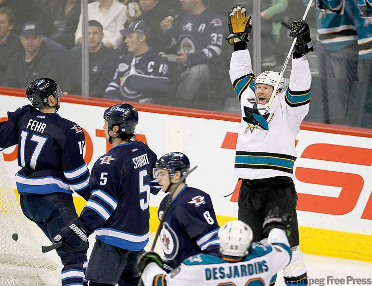 CP
John Woods / THE CANADIAN PRESS
San Jose�s Brad Winchester celebrates after giving the Sharks a 2-0 lead.