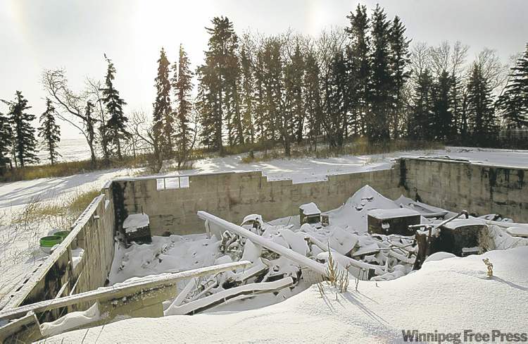 Joe Bryksa / Winnipeg Free Press archives
Only the foundation of the Labossiere home remains near St. Leon, Man. The bodies of three members of the family were found after a fire gutted the house. It was later determined by RCMP that all three died of gunshot wounds.
