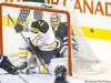 Phil Hossack / Winnipeg Free Press
The Sabres' Jochen Hecht covers up after finding himself the target of his own team inside the Jets net with goalie Ondrej Pavelec in second-period action Thursday.