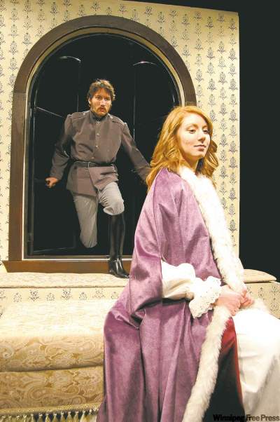 handoutBluntschli (Stephen Currie) enters the room of Raina (Kelly Jenken).