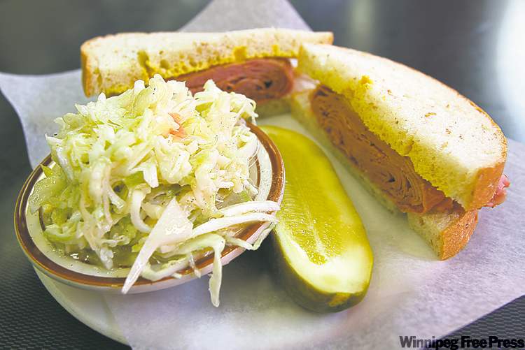 Janek Lowe / Winnipeg Free Press
A corned beef sandwich and a Bud costs $8 at Oscar's Deli on Hargrave Street.