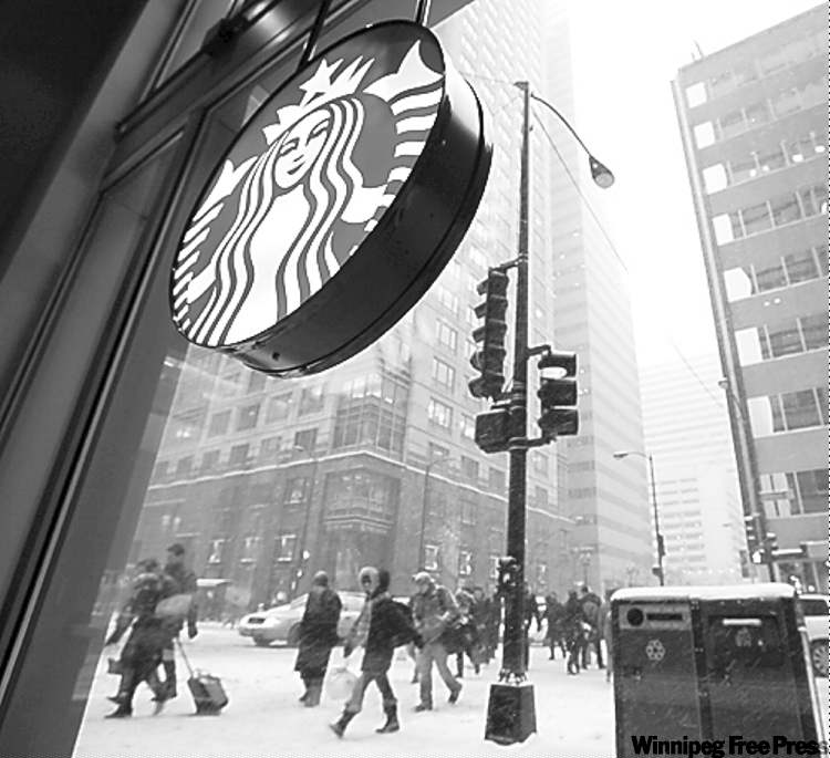 CP
Kiichiro Sato / The Associated Press Archives
A Starbucks in Chicago. The chain plans to sell beer and wine at several locations in the U.S.
