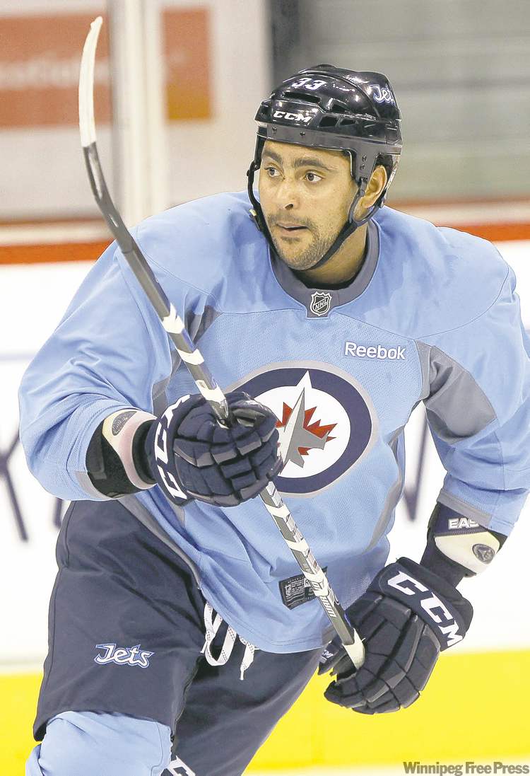 JOE BRYKSA / WINNIPEG FREE PRESS archives
Jets blue-liner Dustin Byfuglien will have his ice time carefully monitored tonight after more than a month on the shelf.