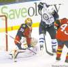 Joe Rimkus Jr. / Miami Herald / MCT
Panthers goalie Scott Clemmensen denies Jets captain Andrew Ladd on Friday night at Bank Atlantic Center in Sunrise, Fla.