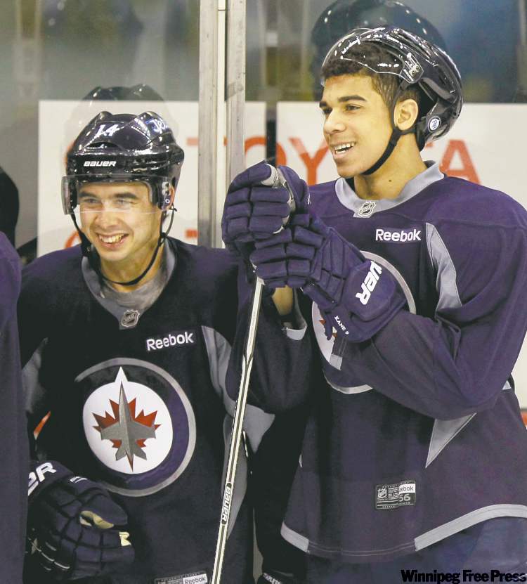 WAYNE GLOWACKI / WINNIPEG FREE PRESS ARCHIVES
The Jets will be all smiles if forwards Tim Stapleton (left) and Evander Kane return to the lineup for tonight�s tilt against the Maple Leafs.