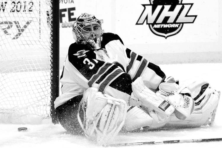 CP
Gene J. Puskar / the associated press
As was often the case Saturday, Jets goalie Ondrej Pavelec was left all alone to face Penguins shooters. Evgeny Malkin slid the puck past him on this play, a second-period breakaway.