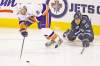 WINNIPEG FREE PRESS
John Woods / The Winnipeg Free Press 
The Winnipeg Jets� Tanner Glass, battling the Isles� Kyle Okposo, said the scoring drought is frustrating but the team is fighting to create opportunities.