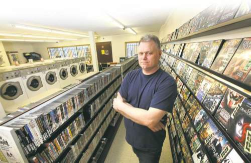 Video 1001 manager Ken Taylor. The video store may soon disappear, replaced by online or pay-per-view options for watching movies.