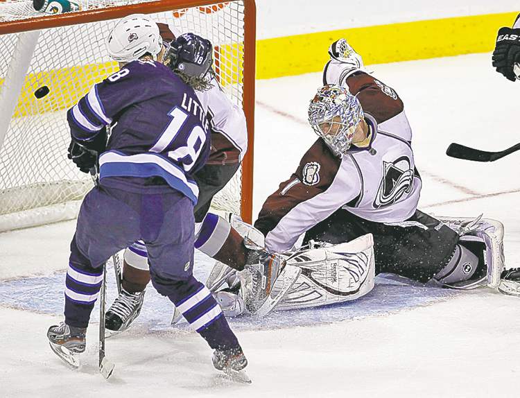 Winnipeg Free Press
Bryan Little gets one by Semyon Varlamov