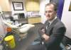 Phil Hossack / Winnipeg Free Press 
Dr. Peter MacDonald sees treating professional athletes as a public duty. 'The work is not that lucrative. It's more about doing your part to help the cause.'