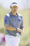 eric risberg / the associated press
Lee Westwood faces Rory McIlroy in Sunday's semifinal. Either can take over top spot in the world by winning this World Golf Championship.